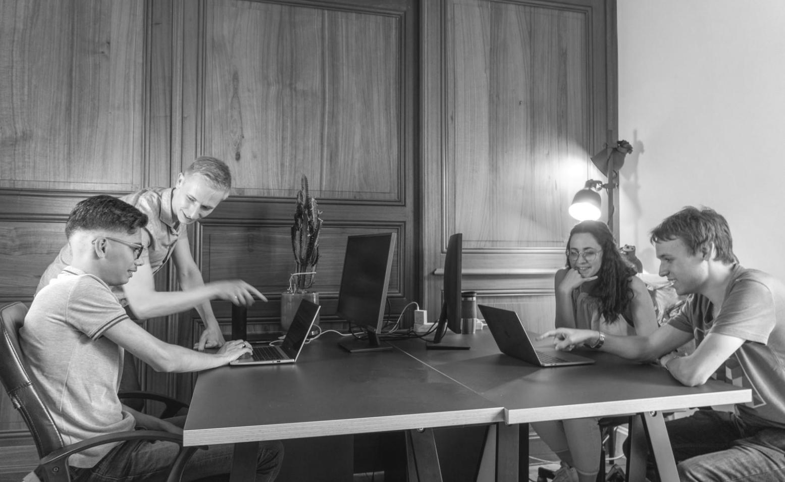 Person reviewing financial documents with structured research materials